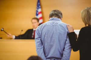 Our New Jersey statutory rape defense lawyer defending a man in court.
