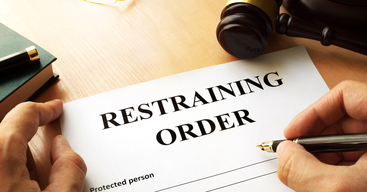 Writing restraining order.